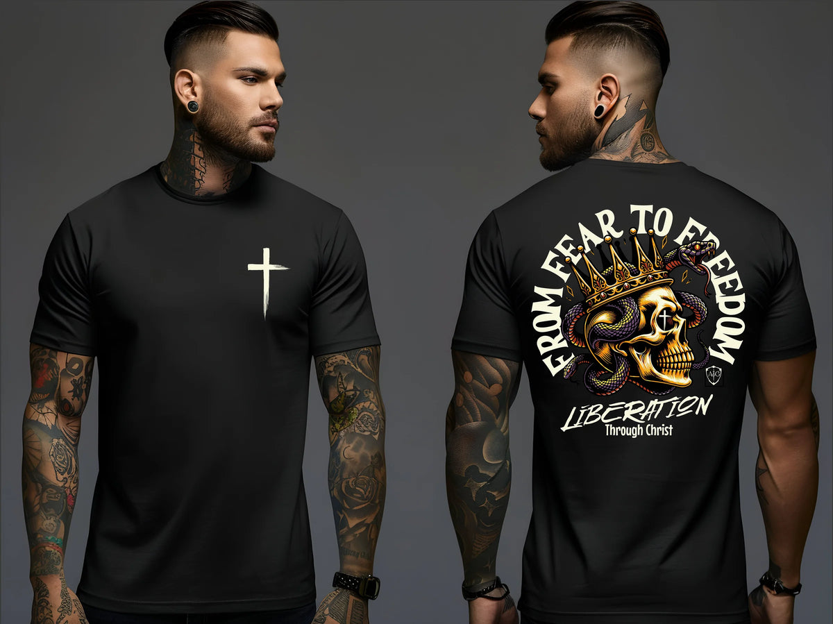 Model in a black Liberation Through Christ t-shirt: cross on front, From Fear to Freedom crowned-skull design on back